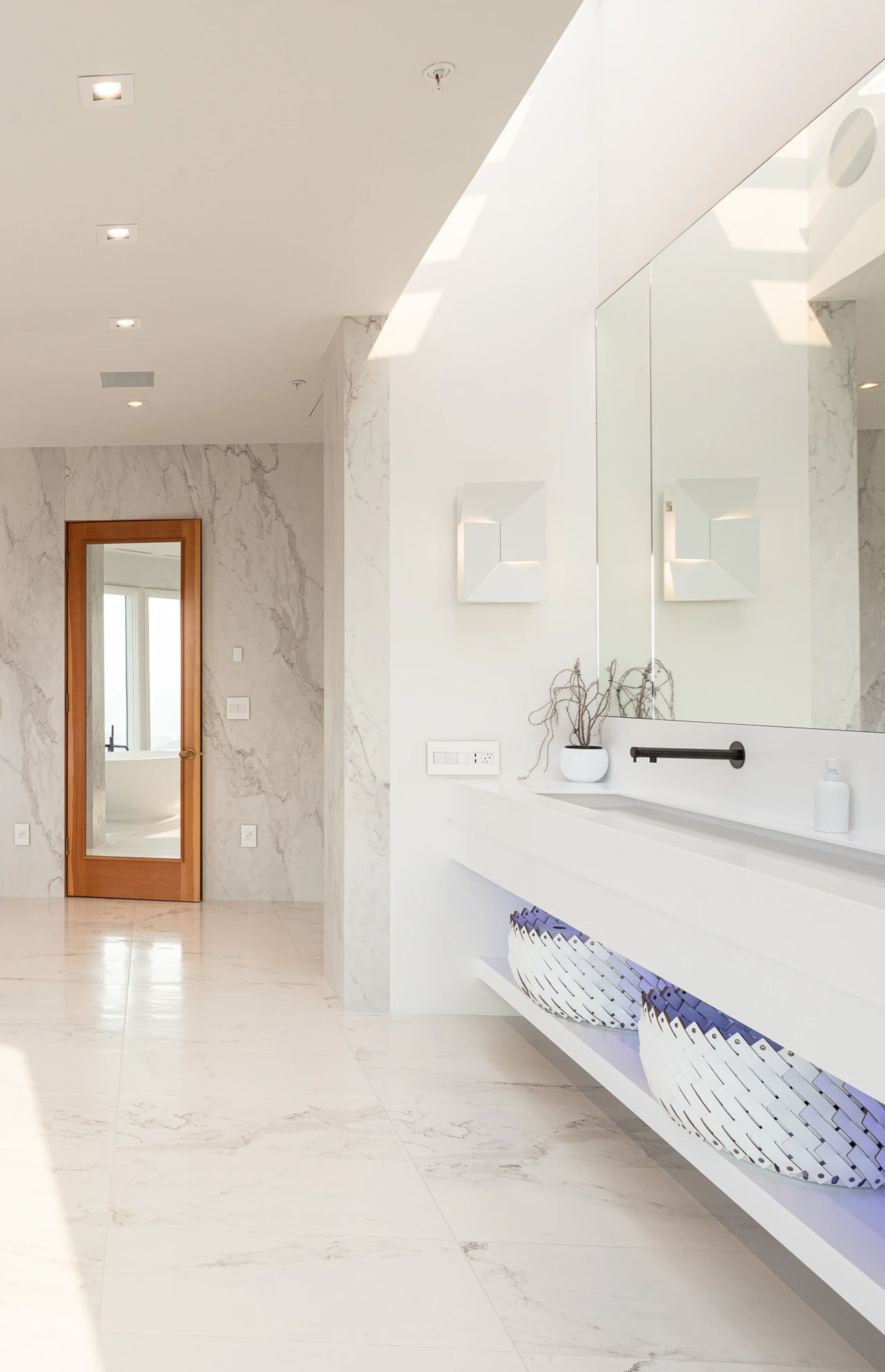 Ultra modern and spacious white bathroom