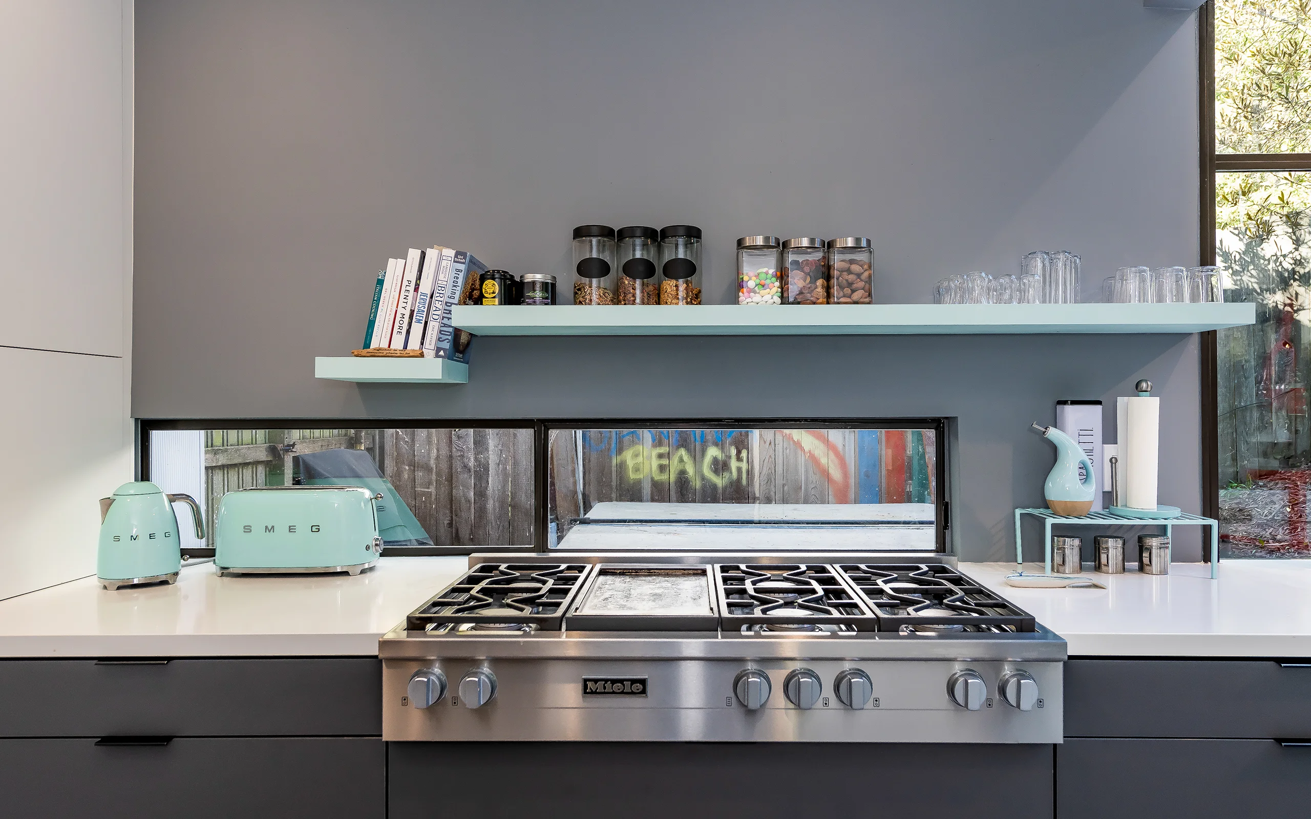 Modern gray and white kitchen cooking range and wall shelves, Berkeley ca005