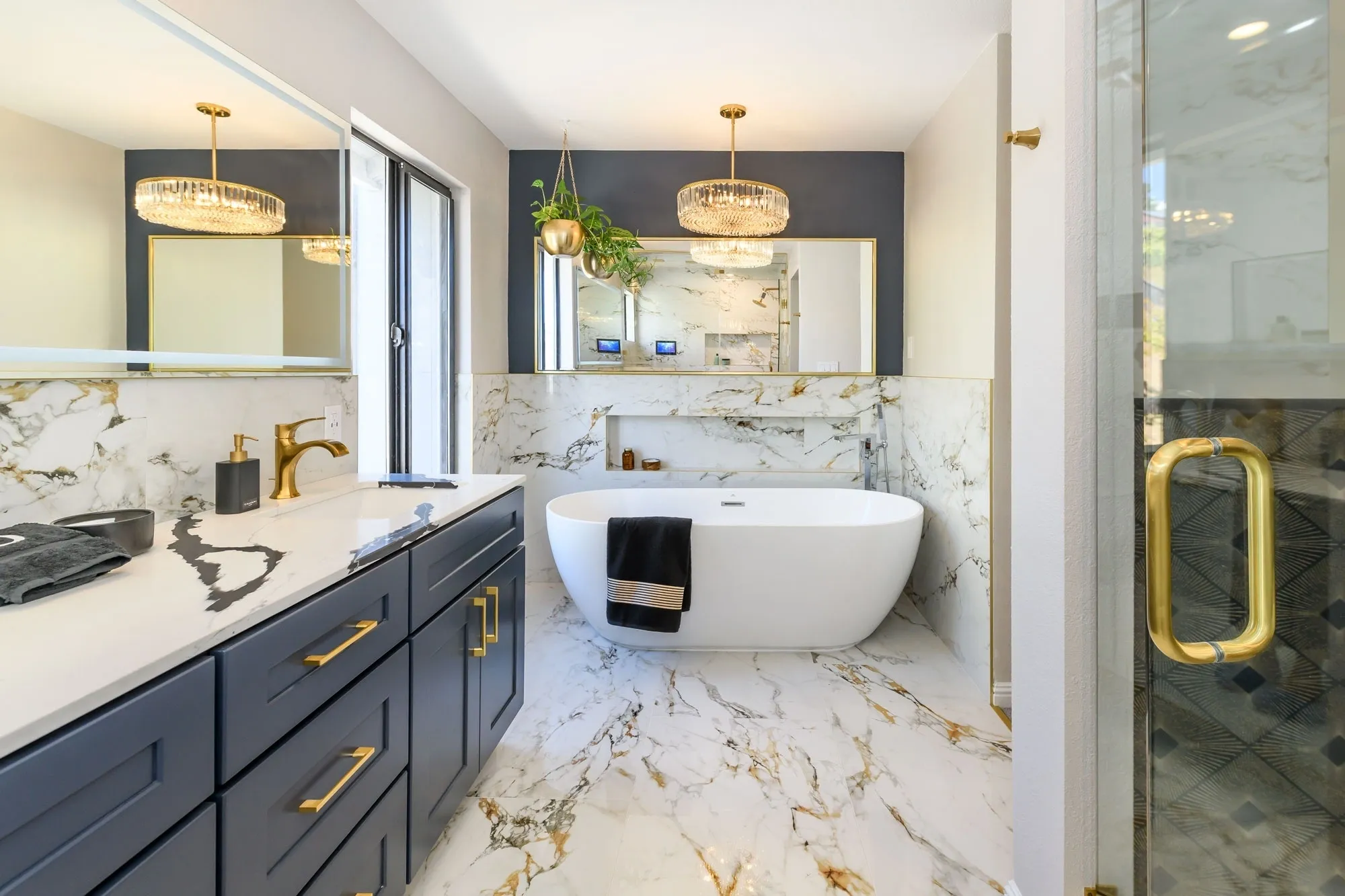 Luxurious marble bathroom with freestanding tub
